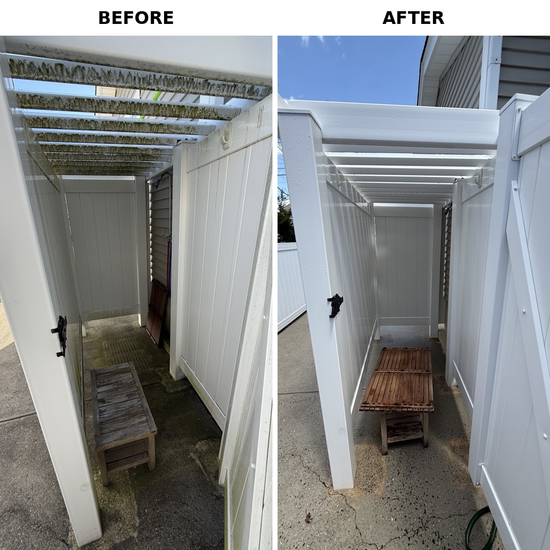 Outdoor shower enclosure soft-washed clean of mildew and algae