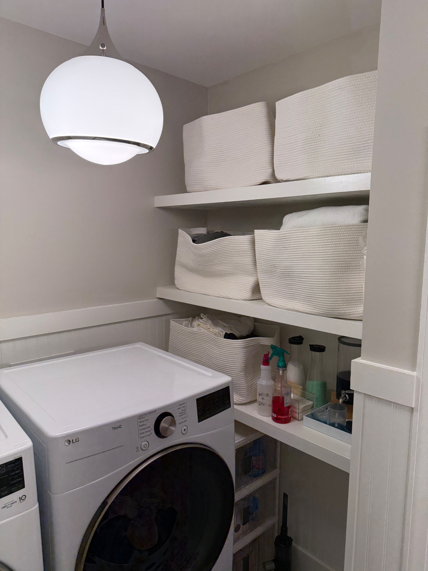 Custom floating shelves installed in a laundry room