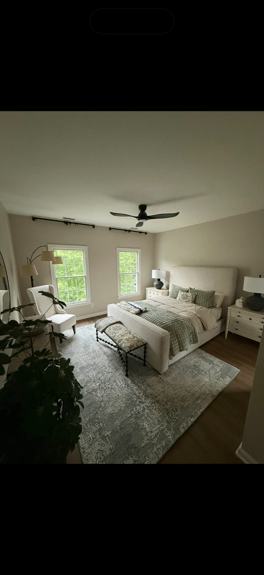 Same bedroom fully renovated with new flooring, fresh paint and furnishings